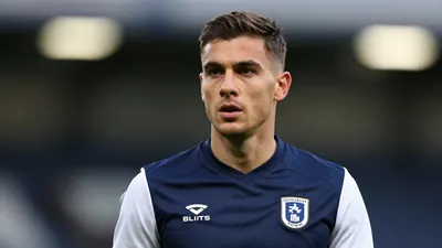 Midfielder Mark Shelton has completed a season-long loan move to Grimsby Town from York City on Deadline Day, becoming...